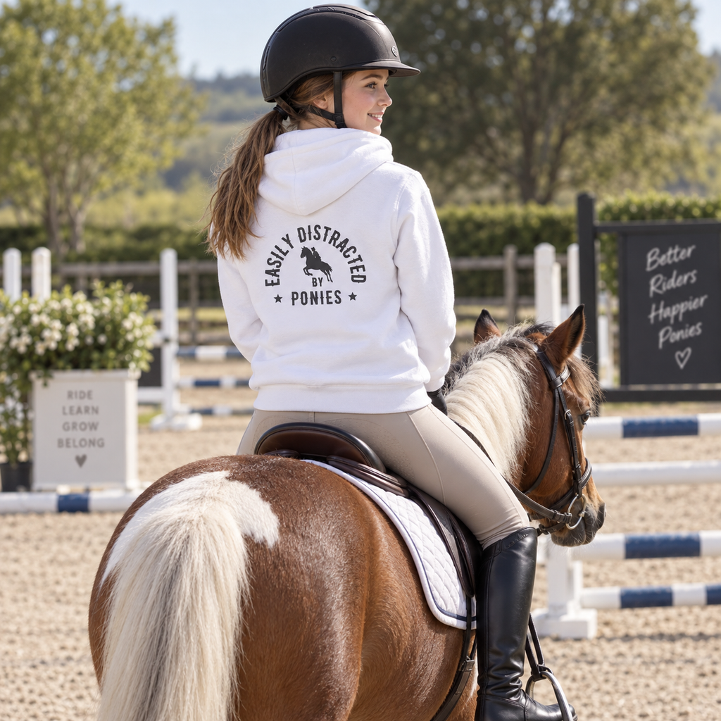Easily distracted by ponies — Youth Heavy Blend Hoodie